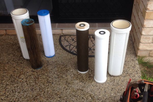 Dirty water filters to be replaced with new clean filters by HC Pure Toowoomba